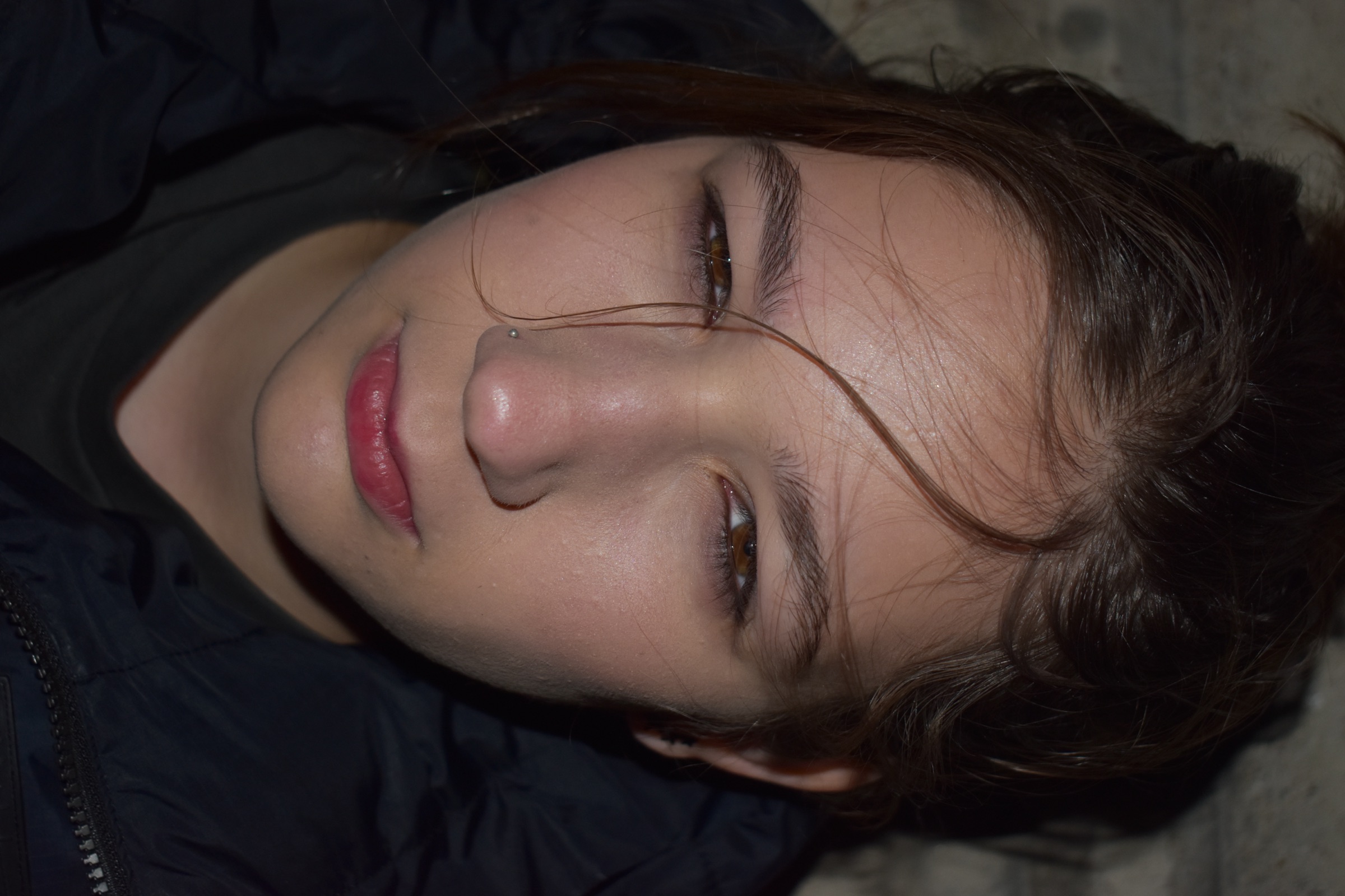 Close-up portrait photograph from the same series